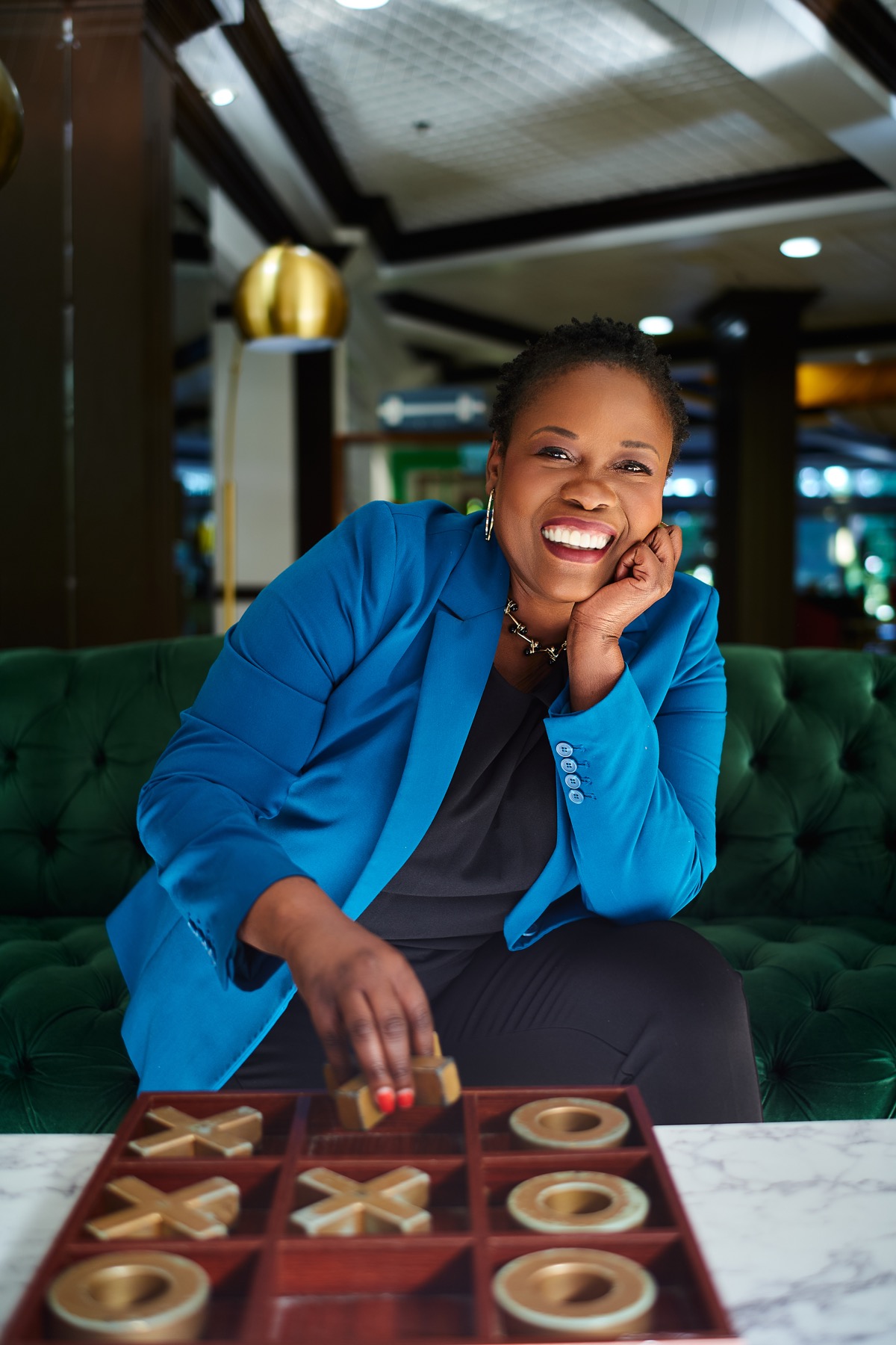 Melissa Dunn smiling in a blue blazer