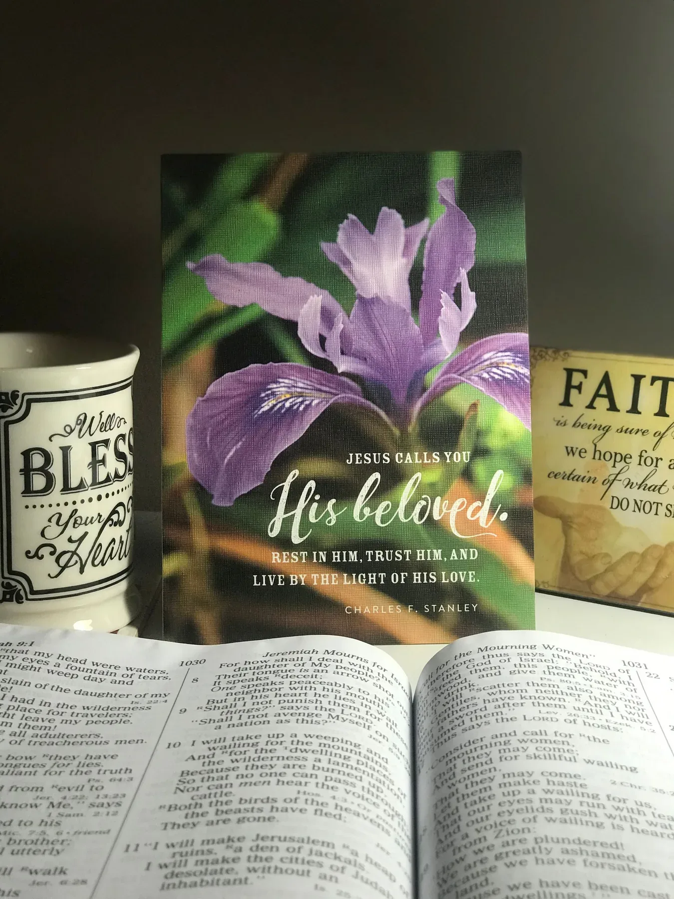 Christian books and an open Bible arranged for devotional study